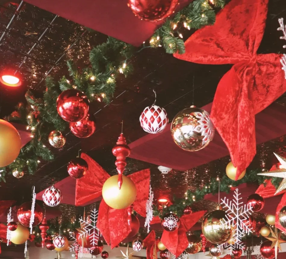 Ceiling of red velvet bows, ornaments and snowflakes