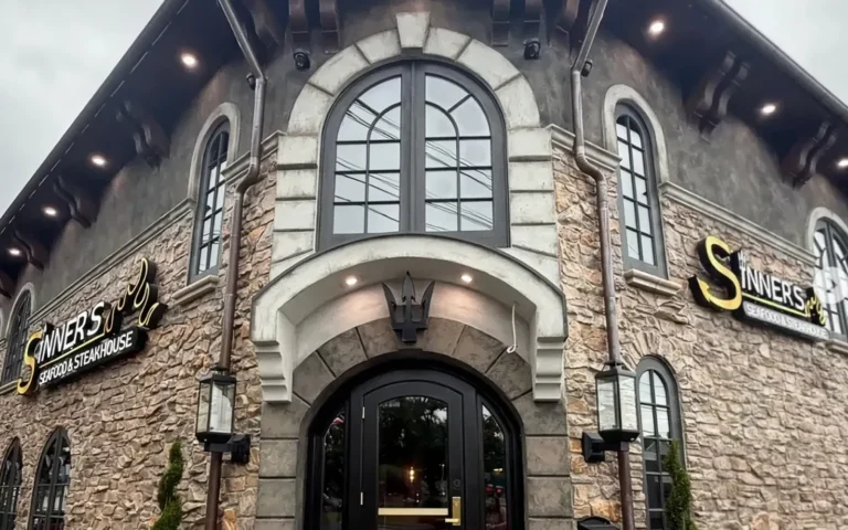 Stone exterior and arched entrance of Sinner's Seafood & Steakhouse at 572 Boulevard, Kenilworth, NJ